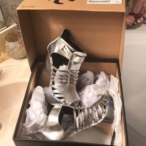 New never worn closet being pretty silver in box